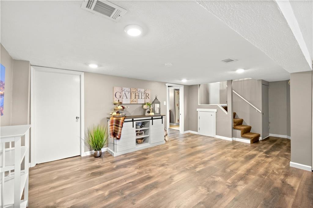 133 Baker Rd Extension Monaca, PA 15061 - Photo 24 of 25 a view of a kitchen with a sink and a refrigerator