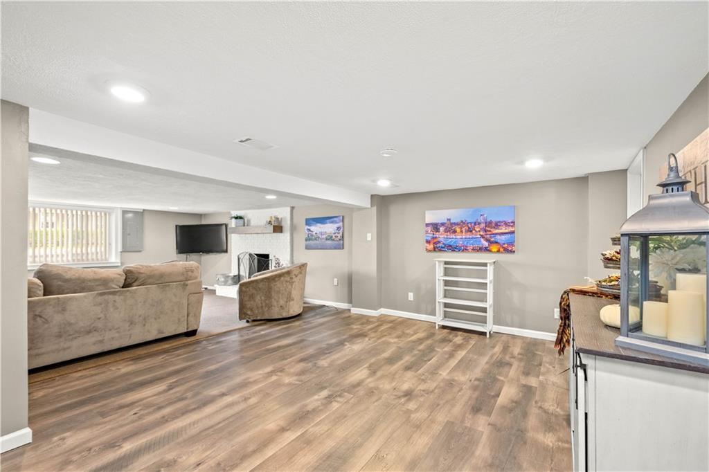 133 Baker Rd Extension Monaca, PA 15061 - Photo 25 of 25 a bedroom with furniture and a flat screen tv