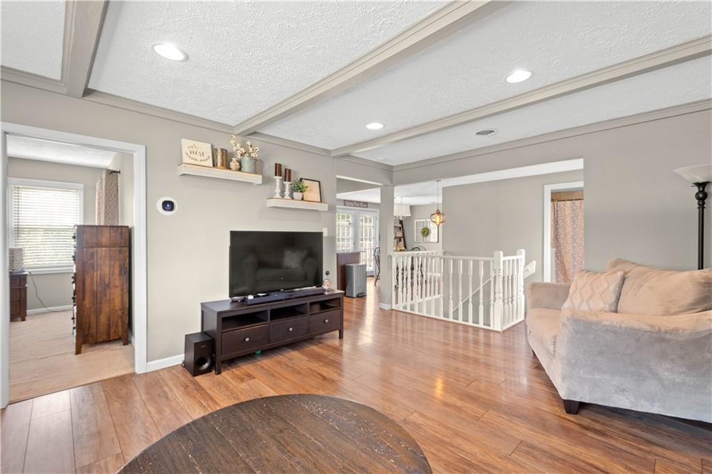 133 Baker Rd Extension Monaca, PA 15061 - Photo 7 of 25 a living room with furniture and a flat screen tv