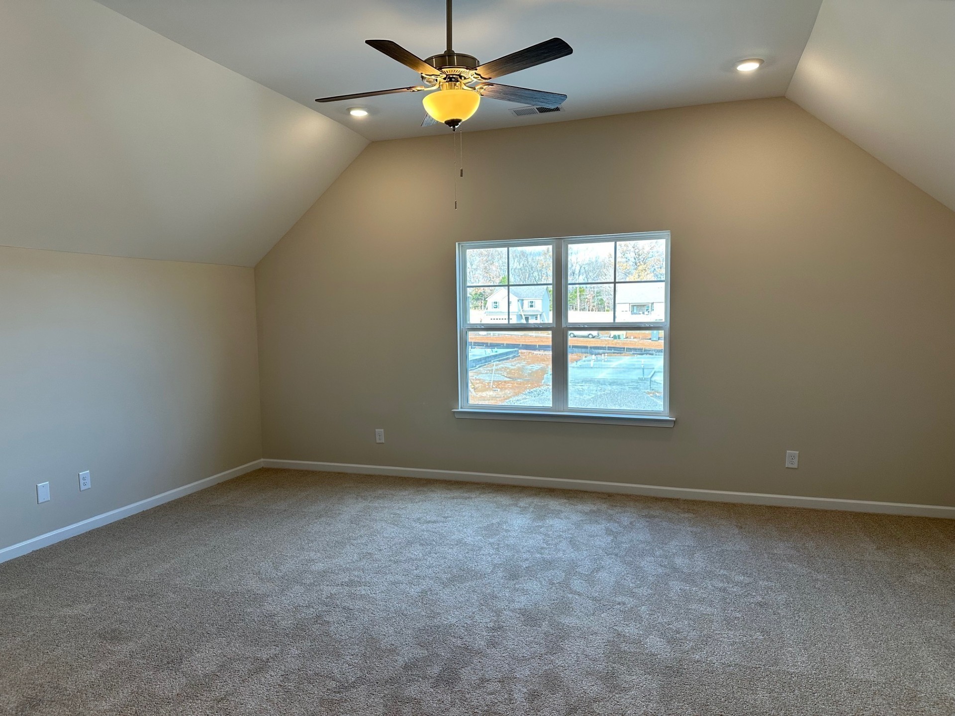 7019 Sully Court Fairview, TN 37062 - Photo 13 of 14 an empty room with a window and ceiling fan