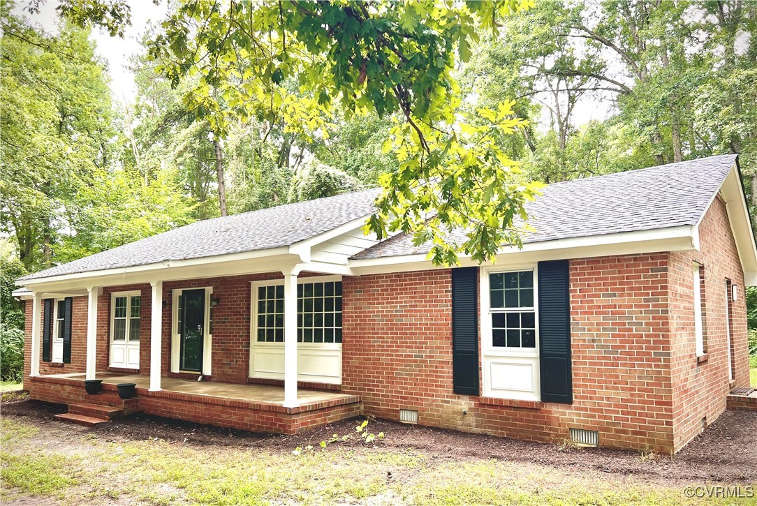12800 South Chester Road Chester, VA 23831 - Photo 3 of 17 front view of a house with a yard