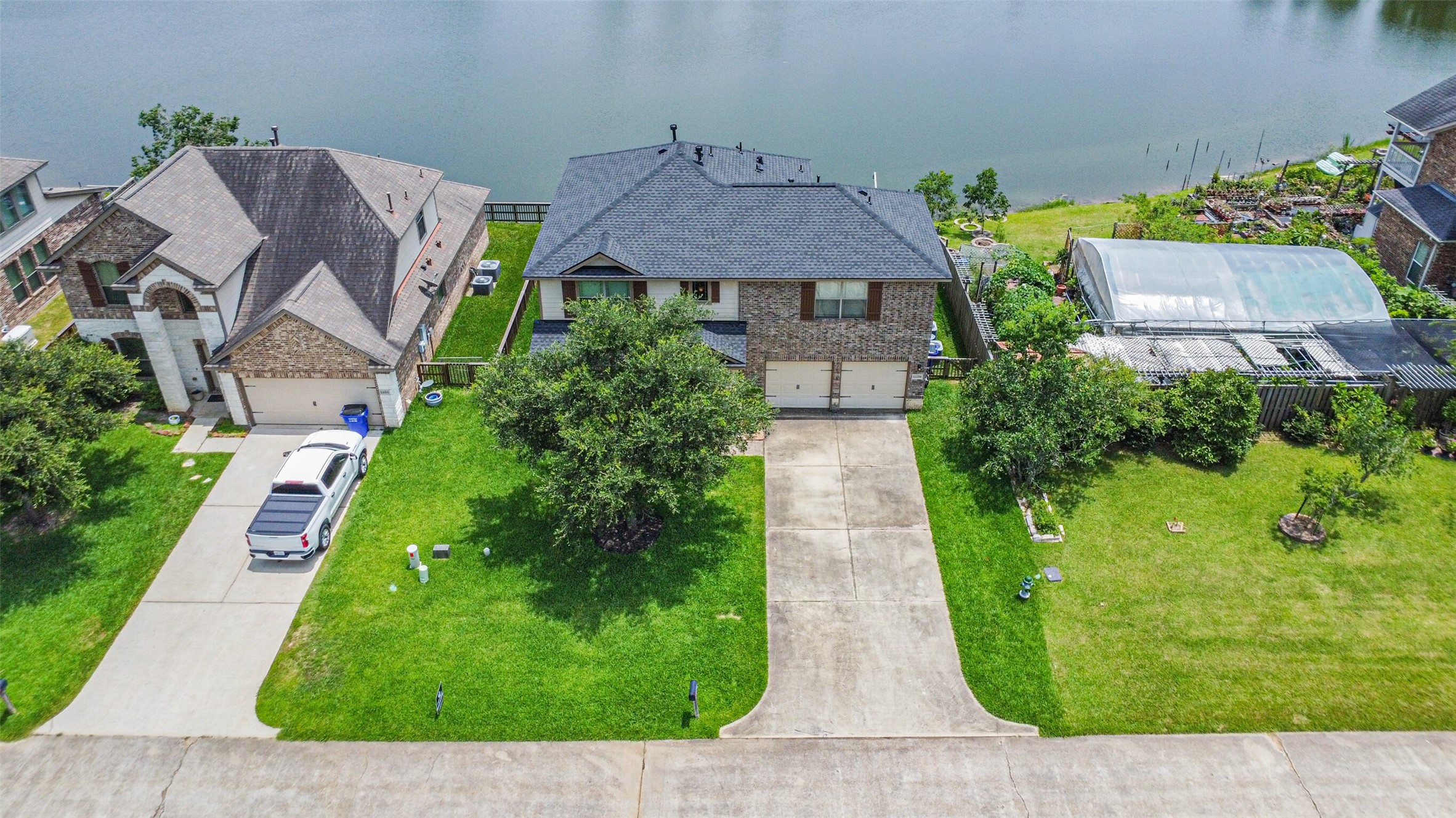 12009 La Salle River Road Conroe, TX 77304 - Photo 5 of 50 an aerial view of a house