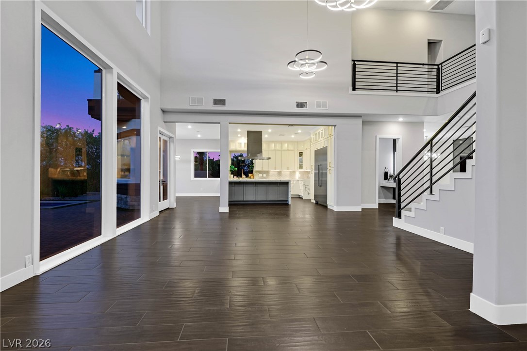 6 Rue Du Ville Henderson, NV 89011 - Photo 99 of 99 This spacious interior features high ceilings, an open floorplan, and abundant natural light.