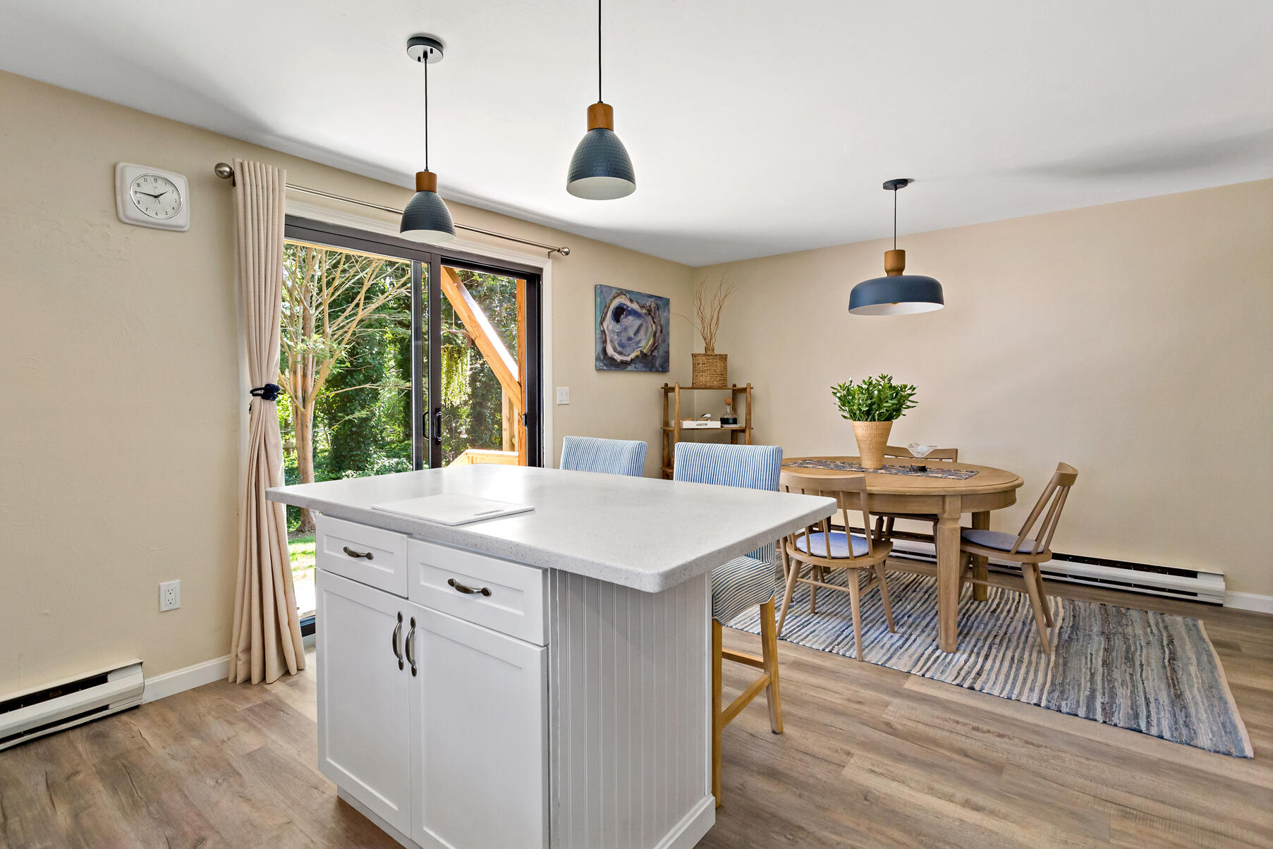195 Falmouth Road, Unit 16A Mashpee, MA 02649 - Photo 11 of 43 a view of a dining room with furniture window and outside view