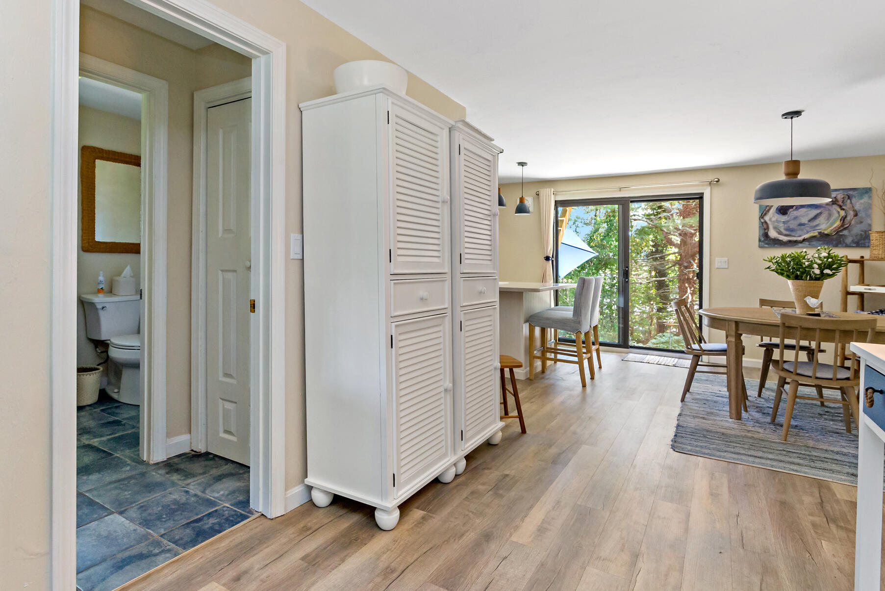 195 Falmouth Road, Unit 16A Mashpee, MA 02649 - Photo 14 of 43 a view of a livingroom with furniture and hardwood floor