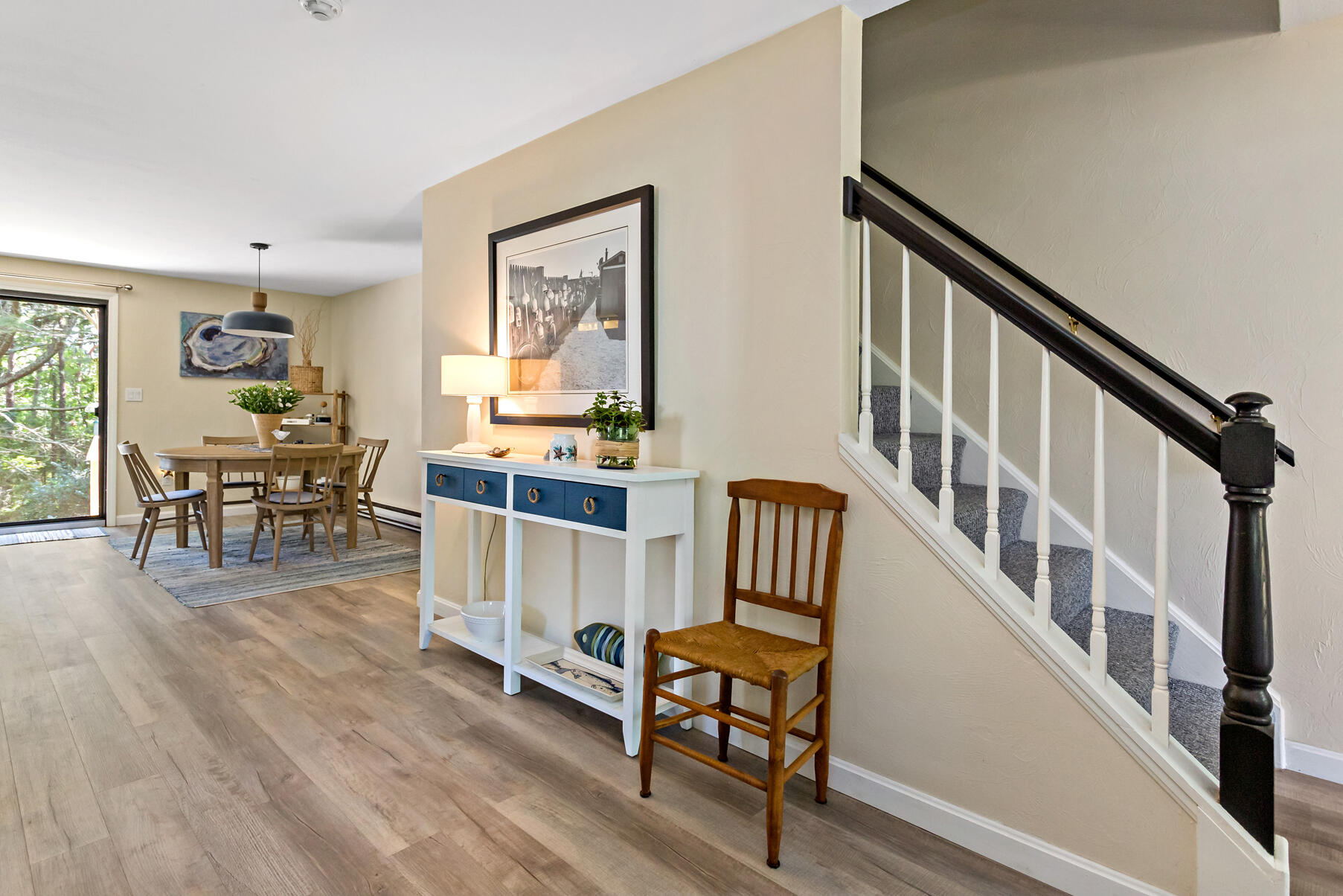 195 Falmouth Road, Unit 16A Mashpee, MA 02649 - Photo 16 of 43 a view of a livingroom with furniture and hardwood floor