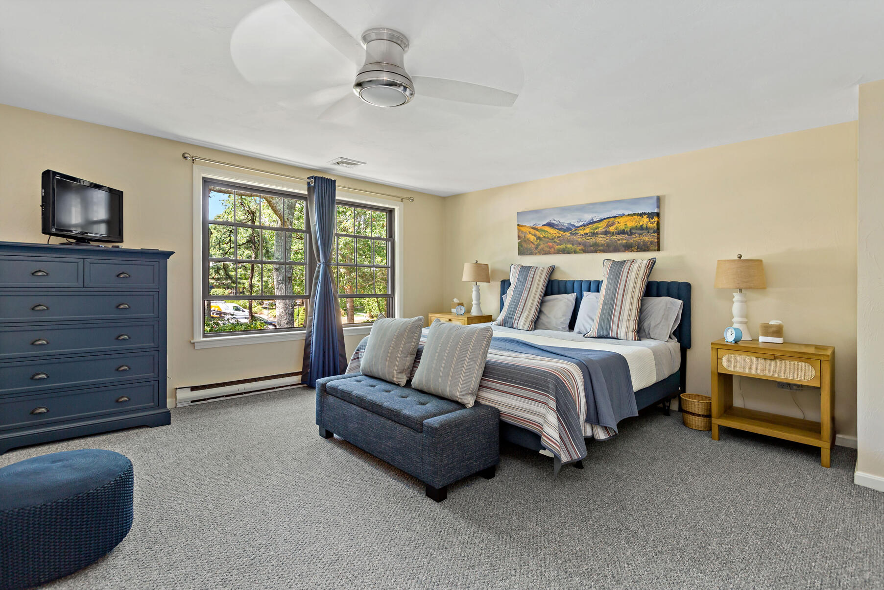 195 Falmouth Road, Unit 16A Mashpee, MA 02649 - Photo 18 of 43 a spacious bedroom with a bed and furniture