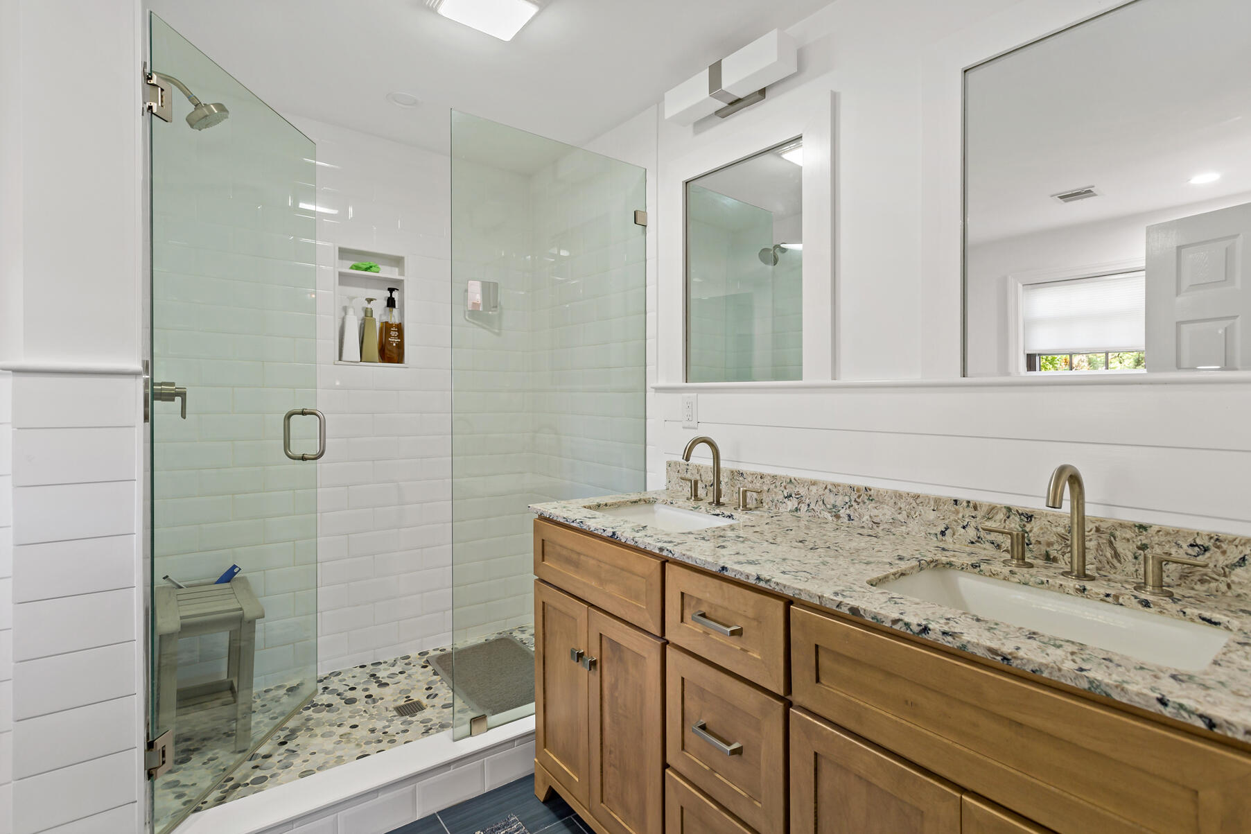 195 Falmouth Road, Unit 16A Mashpee, MA 02649 - Photo 21 of 43 a bathroom with a sink and a mirror