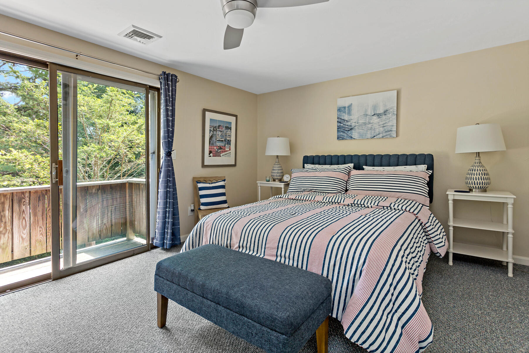195 Falmouth Road, Unit 16A Mashpee, MA 02649 - Photo 24 of 43 a bedroom with a bed and a night stand