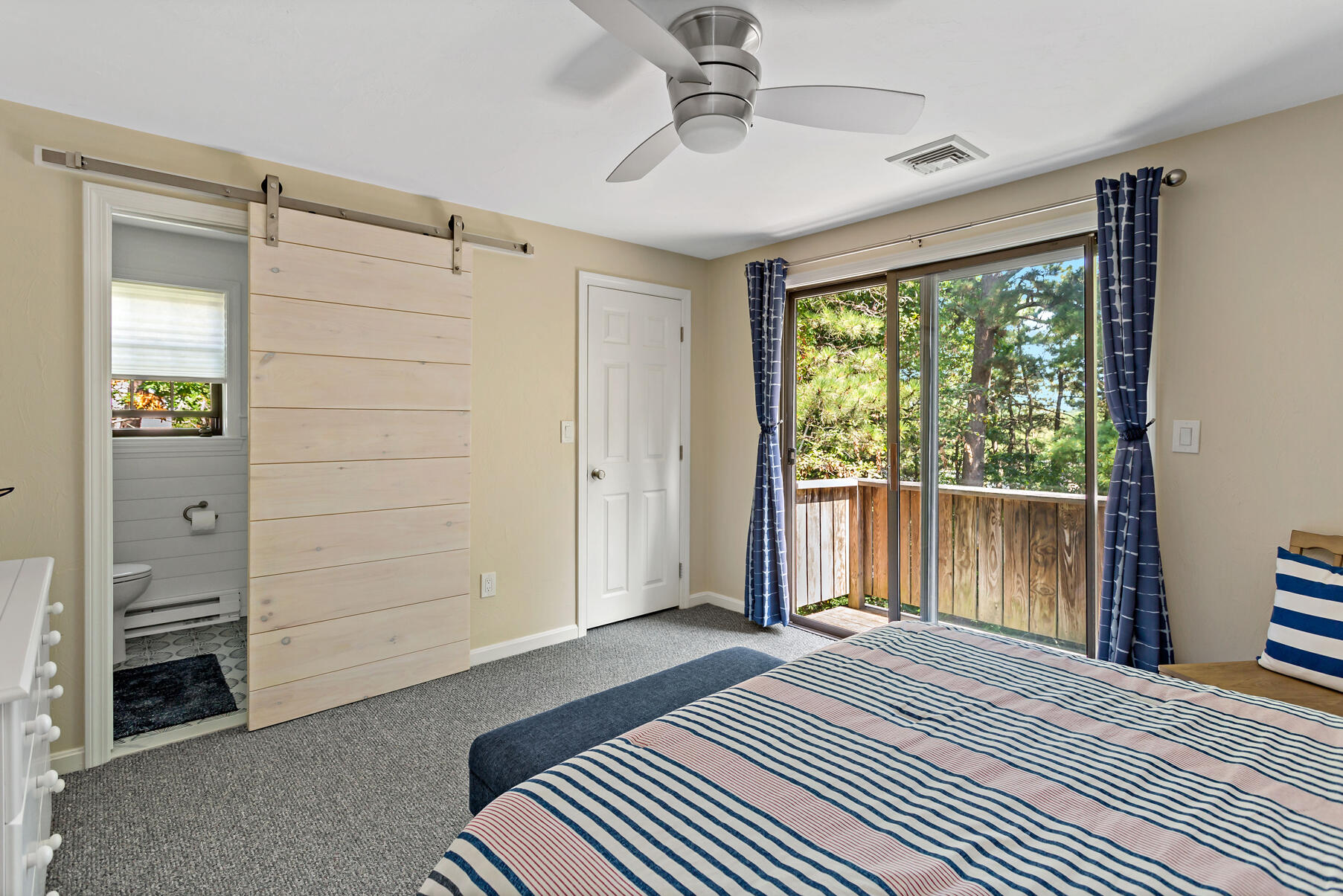 195 Falmouth Road, Unit 16A Mashpee, MA 02649 - Photo 25 of 43 a bedroom with a bed and a window