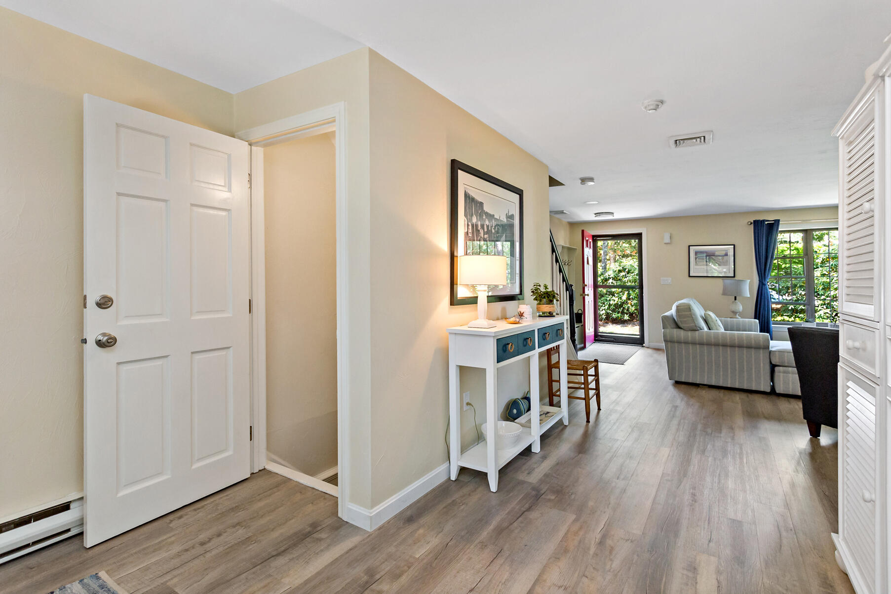 195 Falmouth Road, Unit 16A Mashpee, MA 02649 - Photo 28 of 43 a view of a livingroom with furniture and hardwood floor