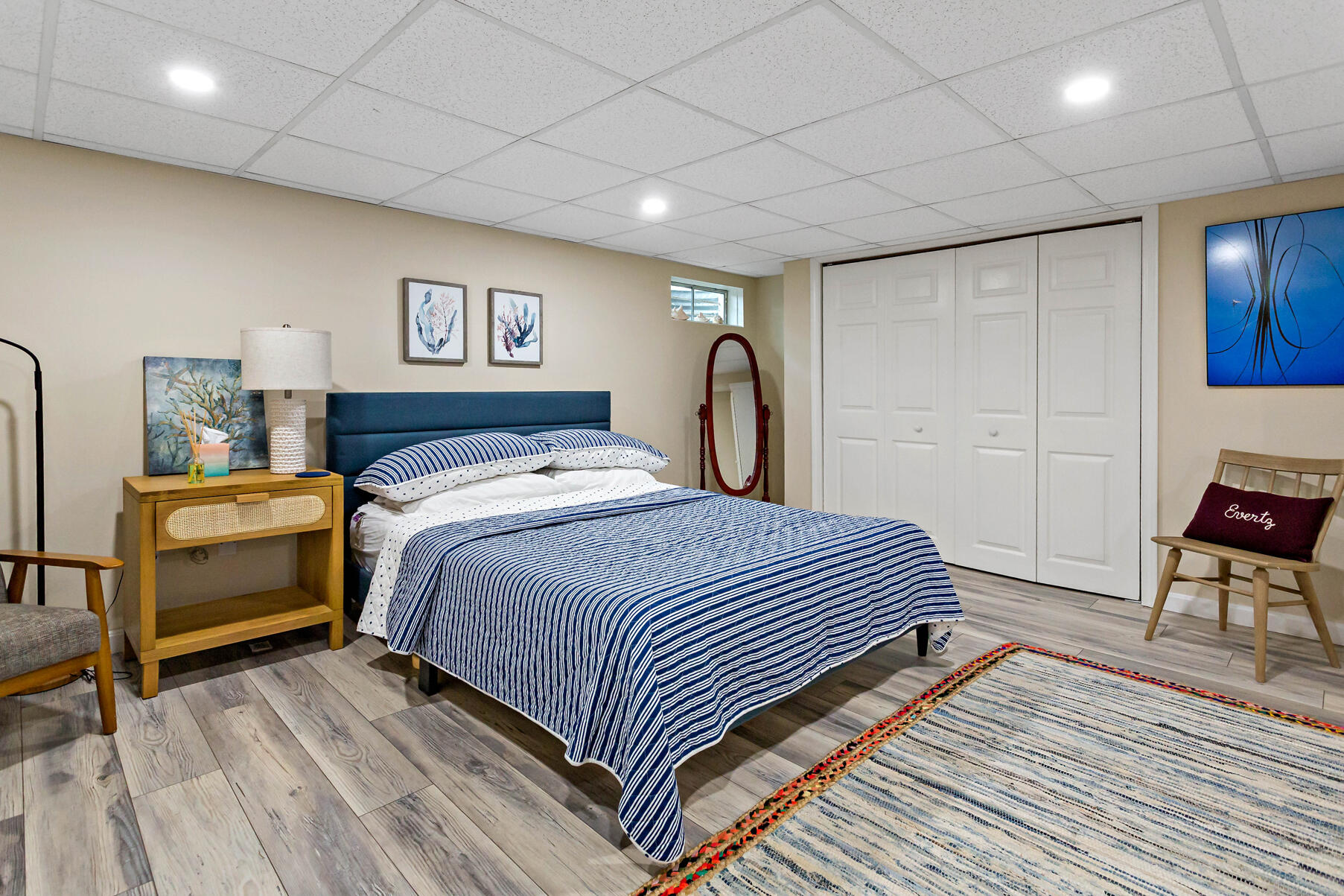 195 Falmouth Road, Unit 16A Mashpee, MA 02649 - Photo 30 of 43 a bedroom with a bed and a table in it