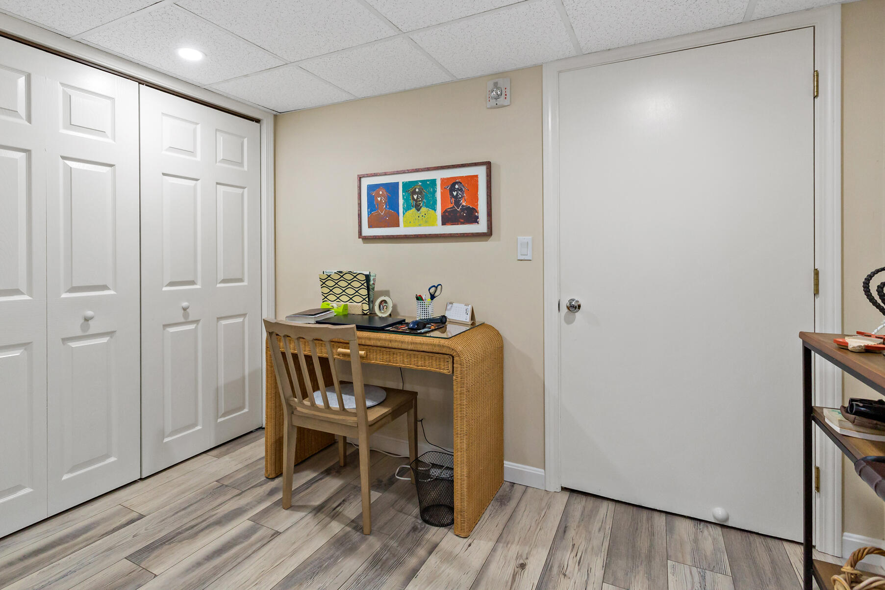 195 Falmouth Road, Unit 16A Mashpee, MA 02649 - Photo 32 of 43 a workspace room with wooden floor and furniture