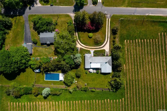 a view of a house with a garden