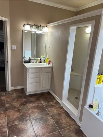 a room with a mirror and shower