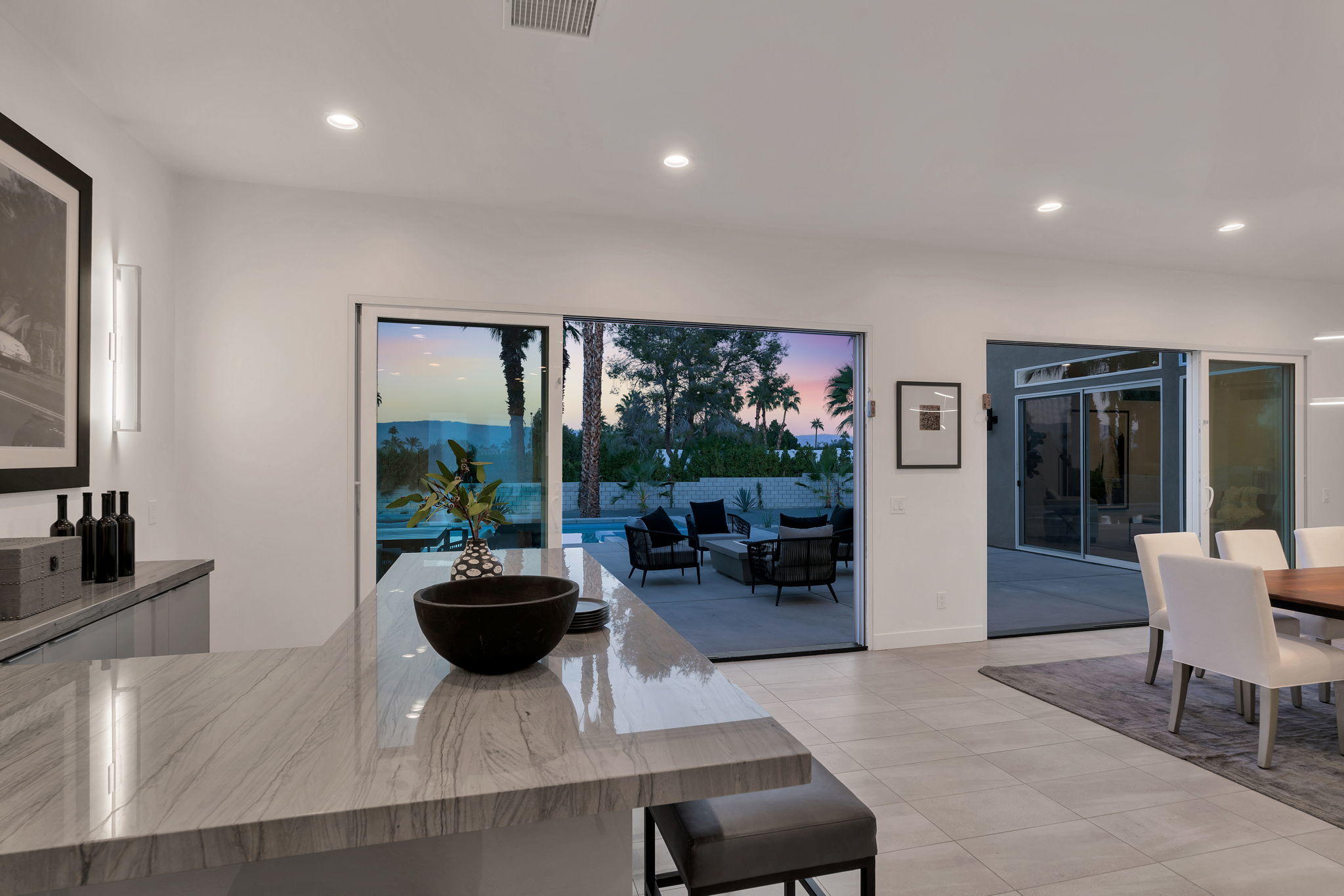 71374 Biskra Road Rancho Mirage, CA 92270 - Photo 21 of 75 a living room with furniture potted plant and a large window