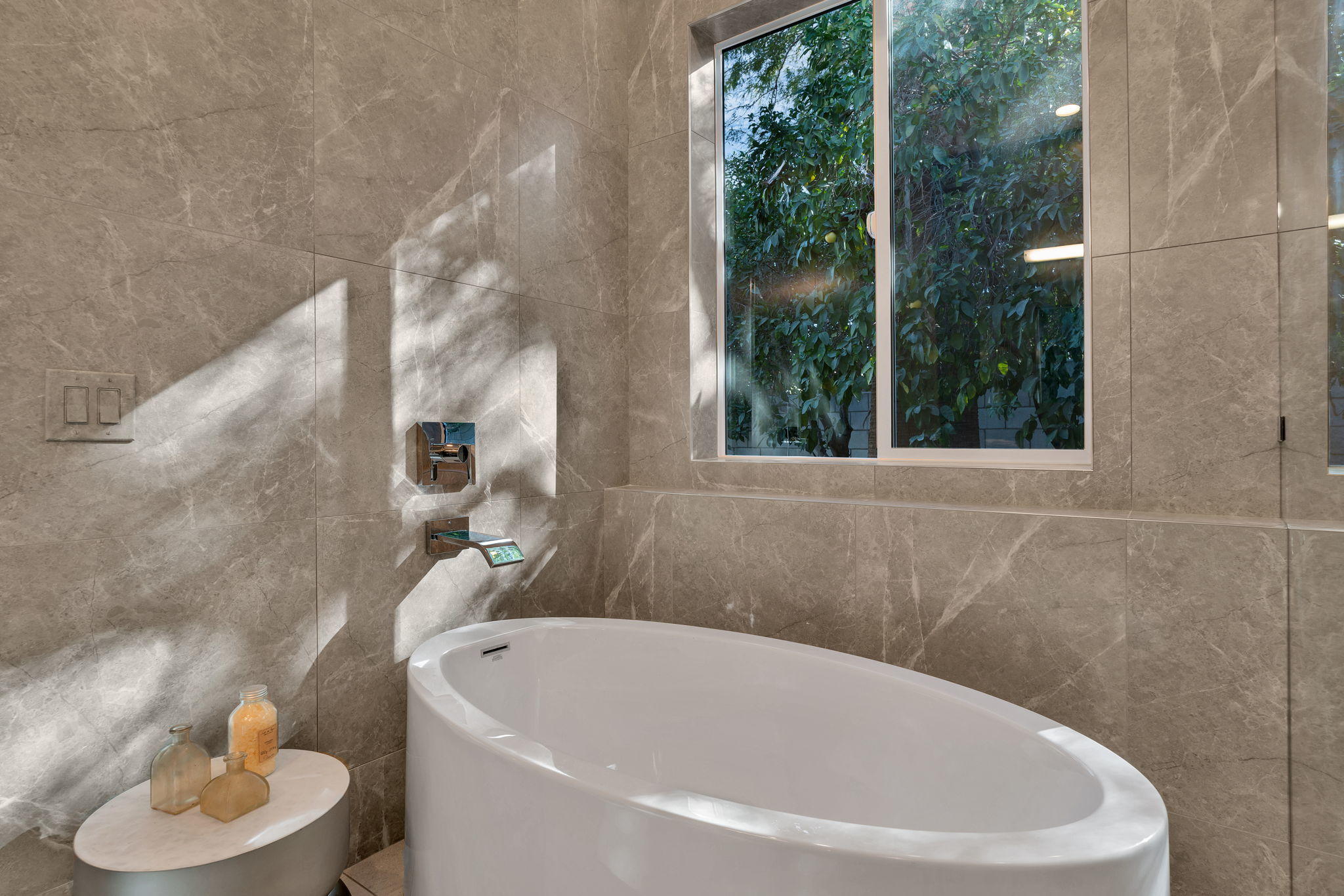 71374 Biskra Road Rancho Mirage, CA 92270 - Photo 32 of 75 a white bath tub sitting next to a white toilet and a shower