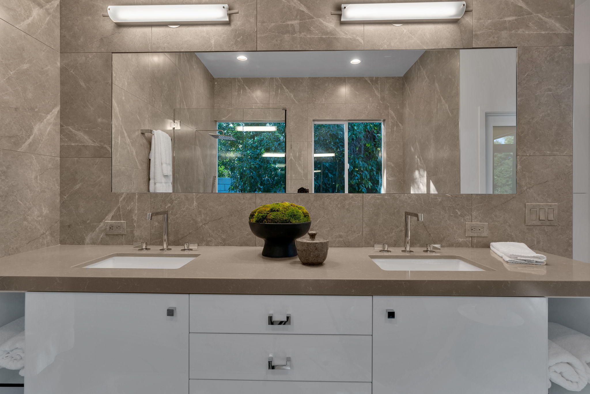 71374 Biskra Road Rancho Mirage, CA 92270 - Photo 33 of 75 a bathroom with a sink and a mirror