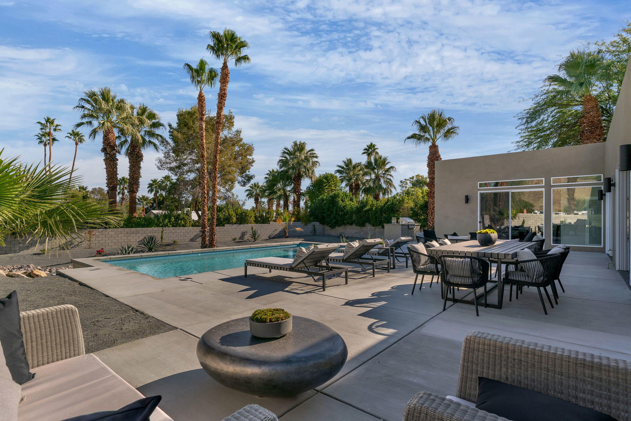 71374 Biskra Road Rancho Mirage, CA 92270 - Photo 50 of 75 a view of a backyard with plants and patio