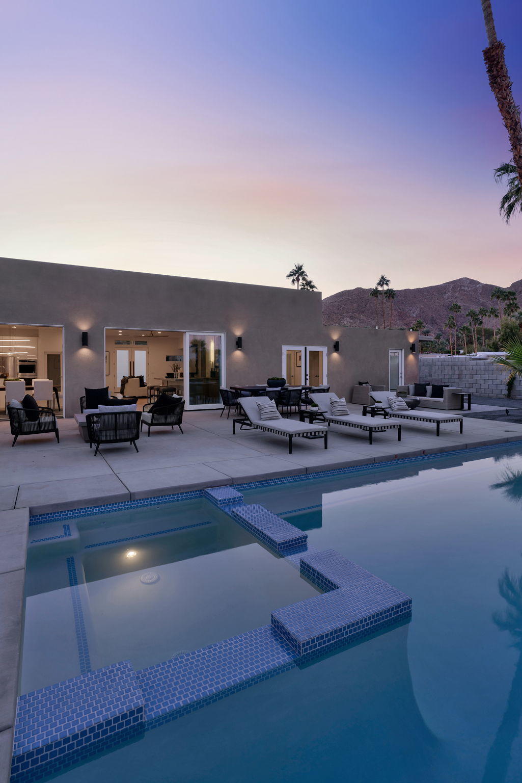 71374 Biskra Road Rancho Mirage, CA 92270 - Photo 55 of 75 a view of a patio with couches and table and chairs