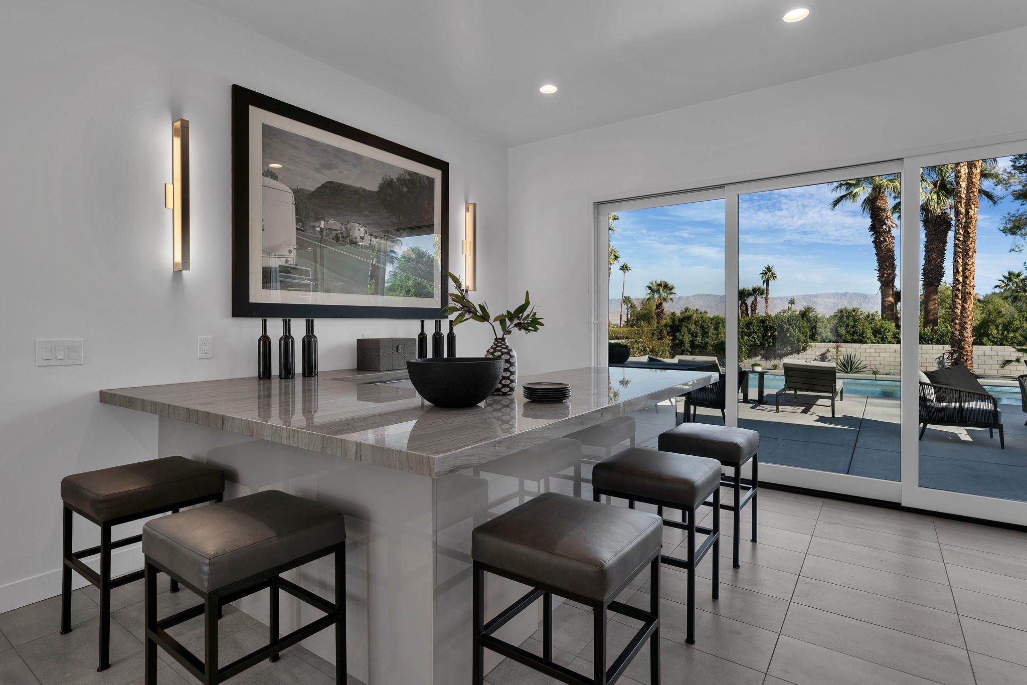 71374 Biskra Road Rancho Mirage, CA 92270 - Photo 8 of 75 a dining room with furniture and a large window