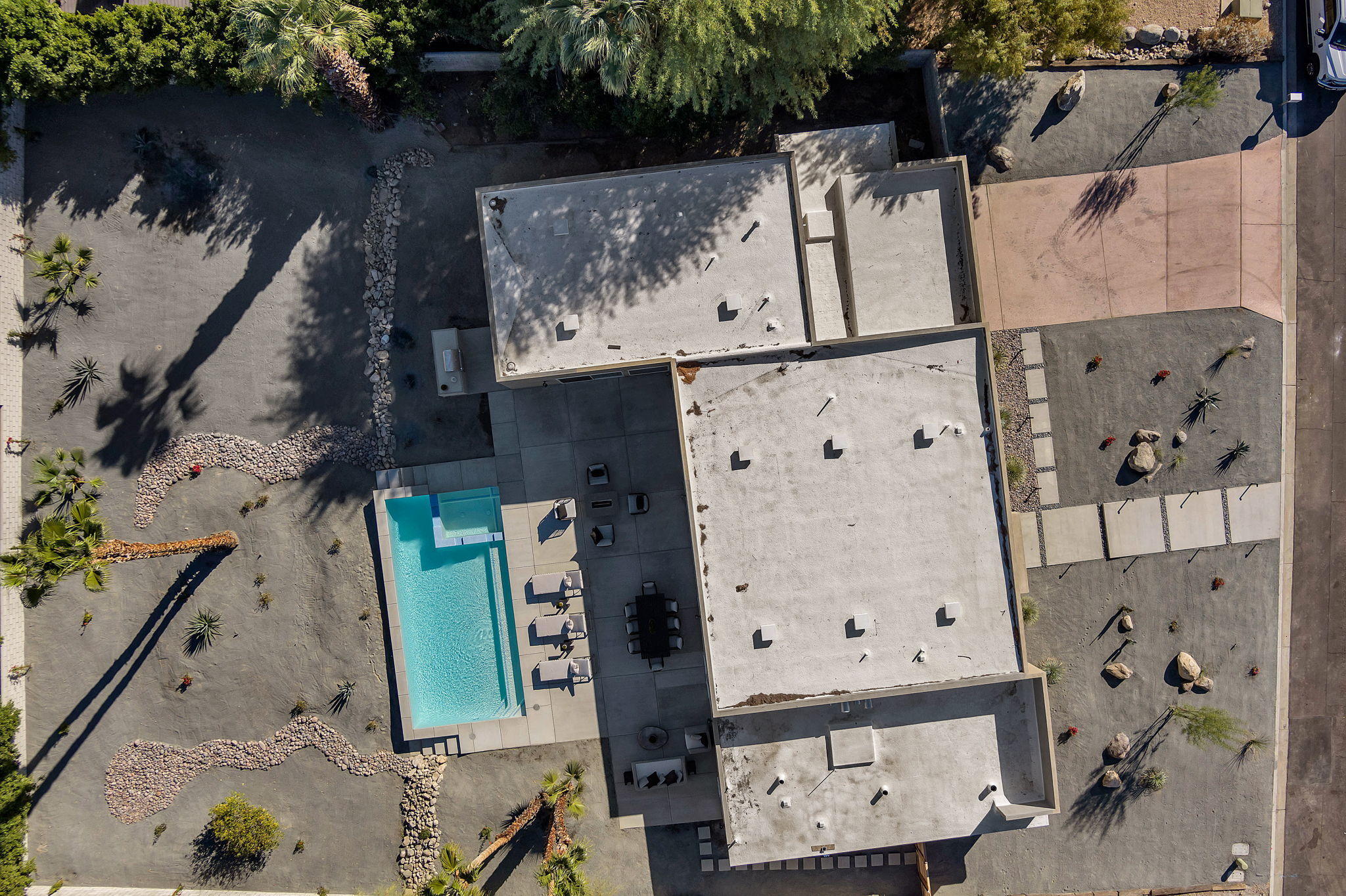 71374 Biskra Road Rancho Mirage, CA 92270 - Photo 71 of 75 an aerial view of a house with a garden