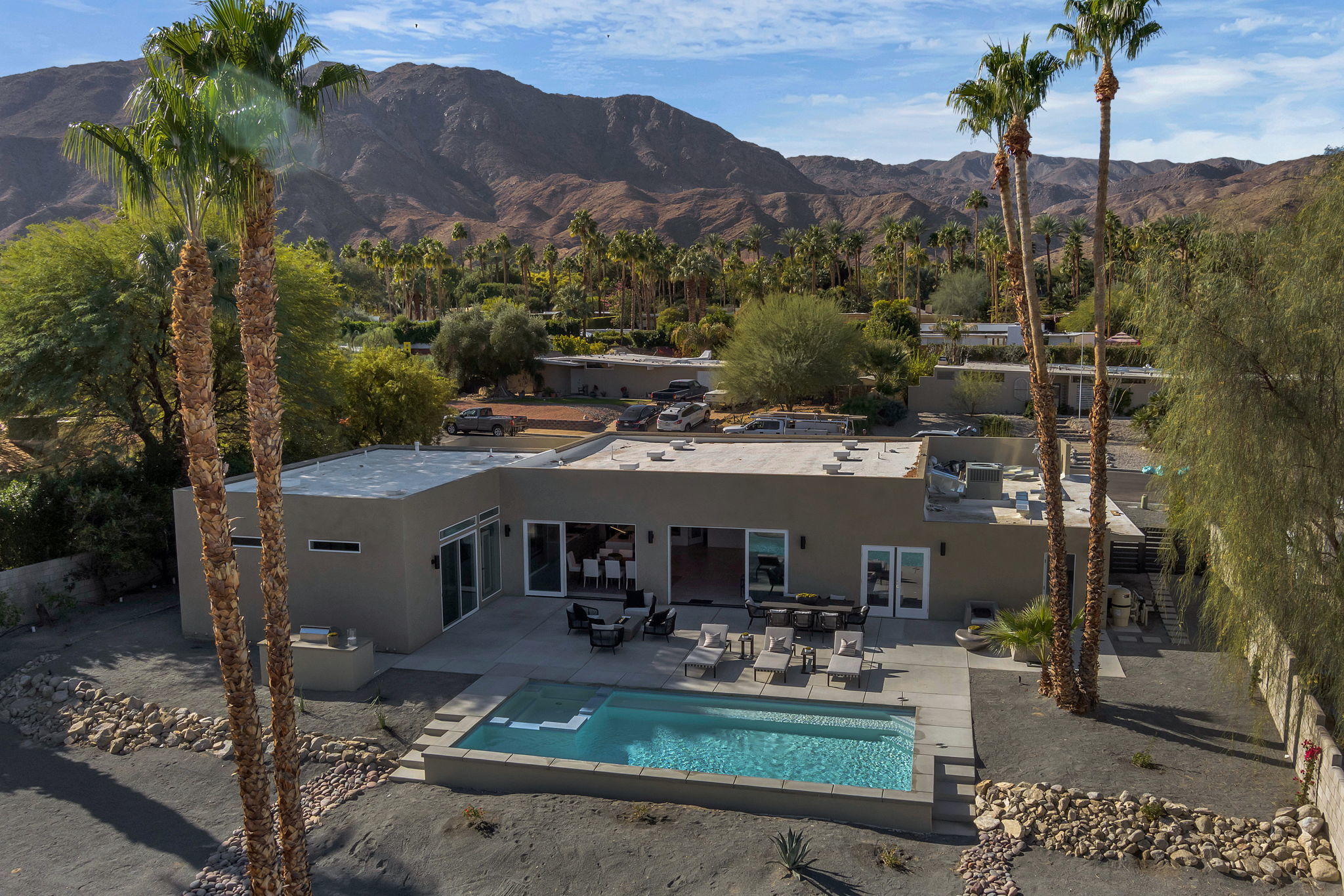 71374 Biskra Road Rancho Mirage, CA 92270 - Photo 72 of 75 a view of a house with backyard porch and outdoor seating