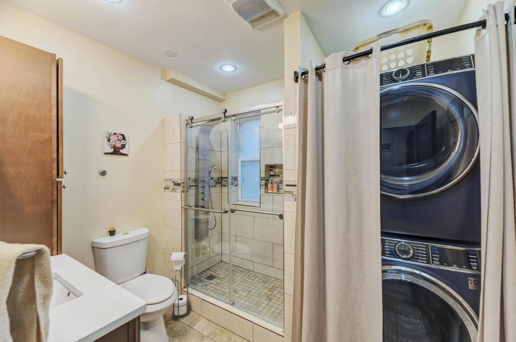 1941 North Harding Avenue Chicago, IL 60647 - Photo 13 of 44 a bathroom with a toilet and a shower