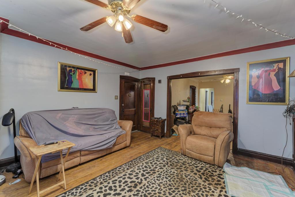 1941 North Harding Avenue Chicago, IL 60647 - Photo 24 of 44 a living room with furniture and a rug