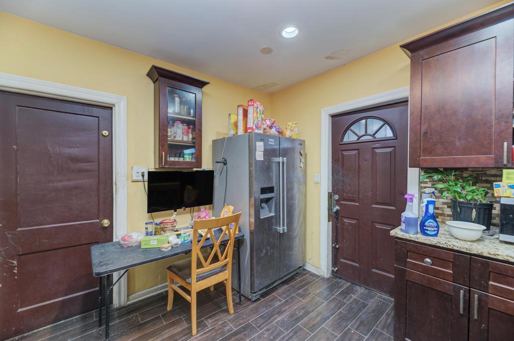1941 North Harding Avenue Chicago, IL 60647 - Photo 31 of 44 a view of a workspace with furniture and wooden floor