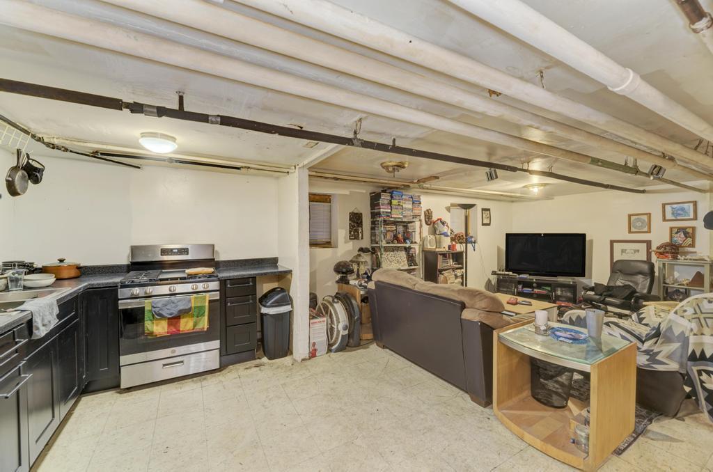 1941 North Harding Avenue Chicago, IL 60647 - Photo 37 of 44 a view of a kitchen with a stove cabinets and a kitchen