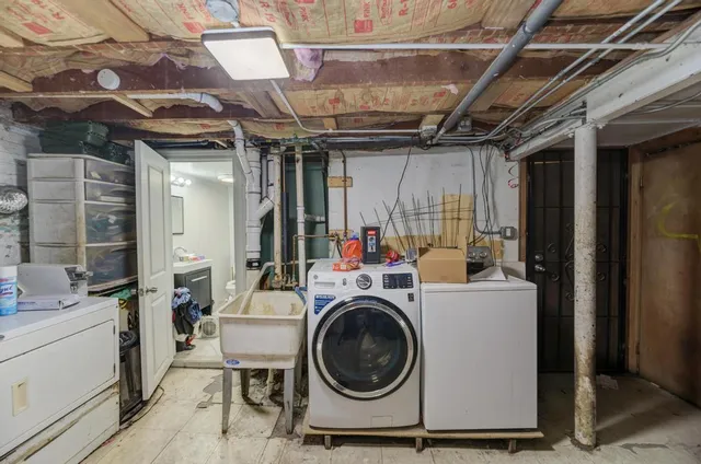 a view of a storage room with washer and dryer