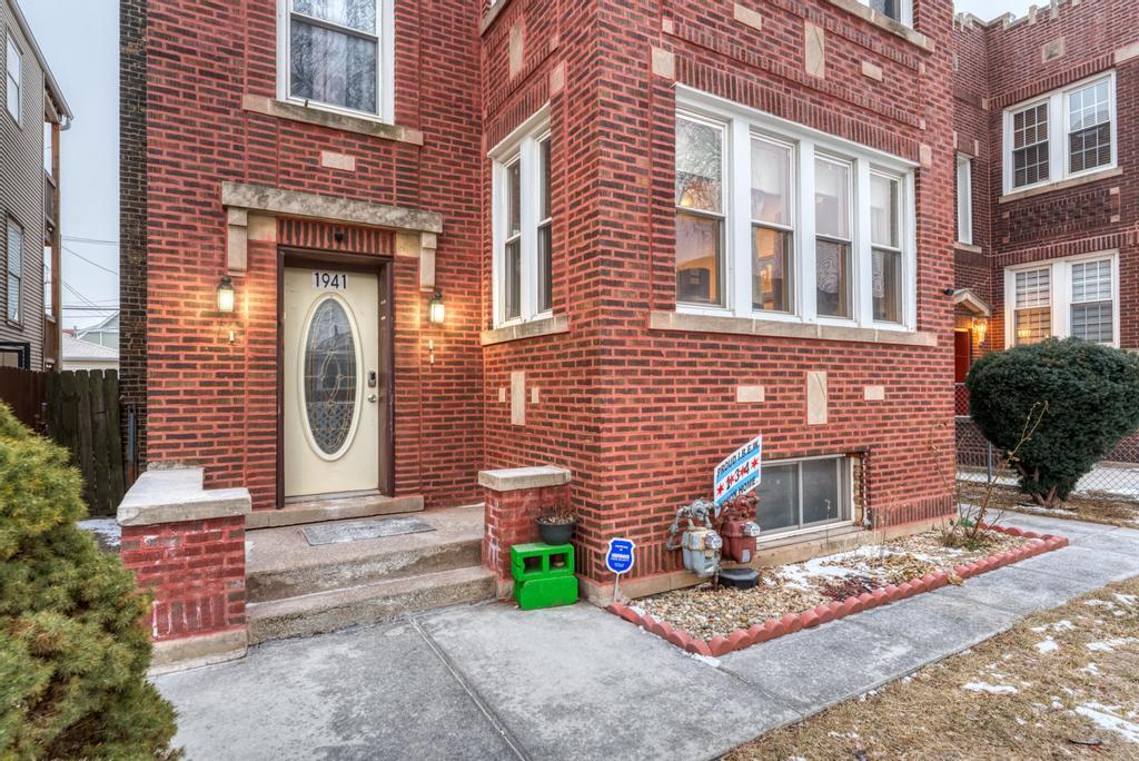 1941 North Harding Avenue Chicago, IL 60647 - Photo 4 of 44 a front view of a house with garden