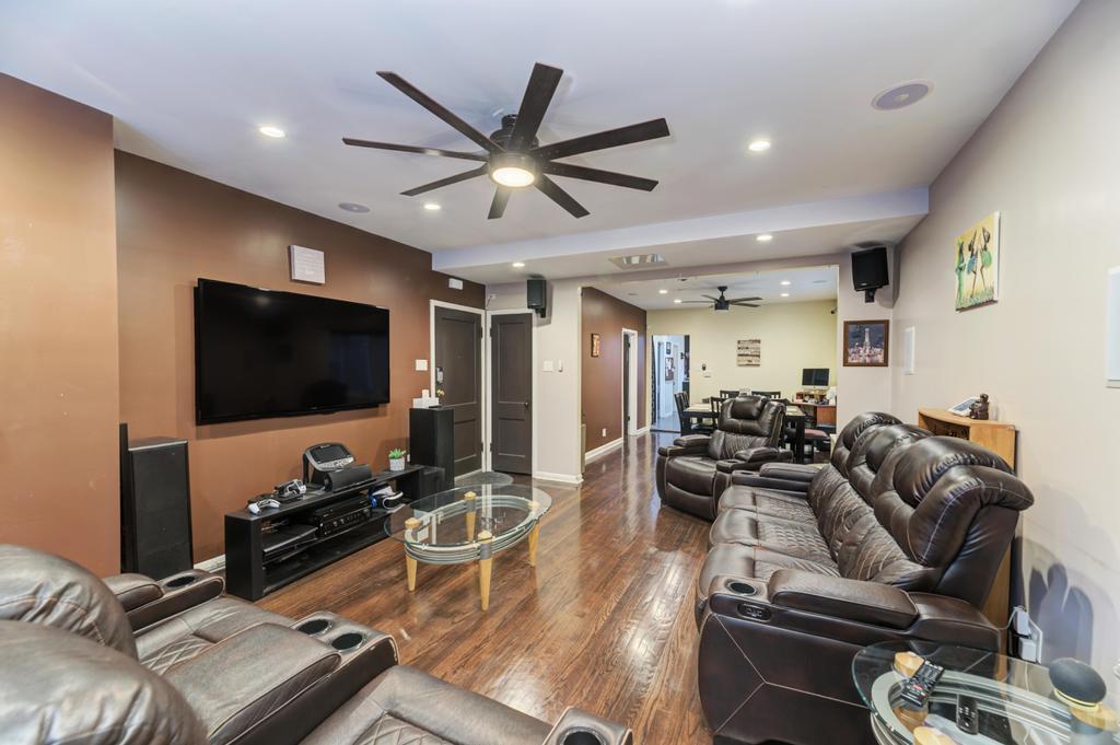 1941 North Harding Avenue Chicago, IL 60647 - Photo 7 of 44 a living room with furniture and a flat screen tv