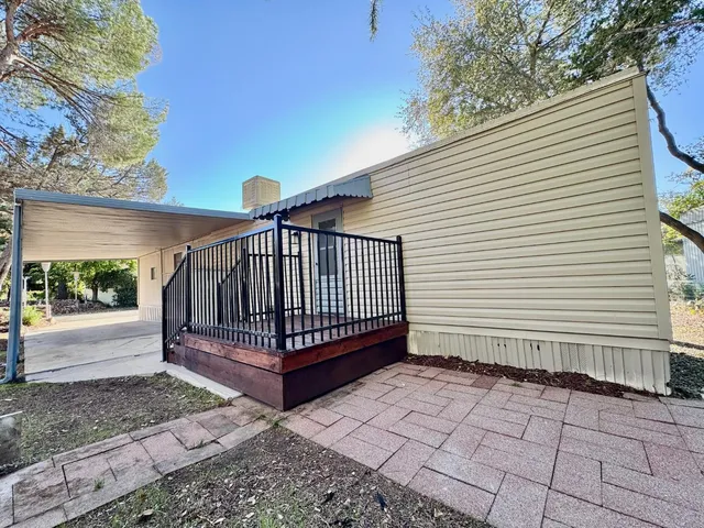 a view of a porch with a bench