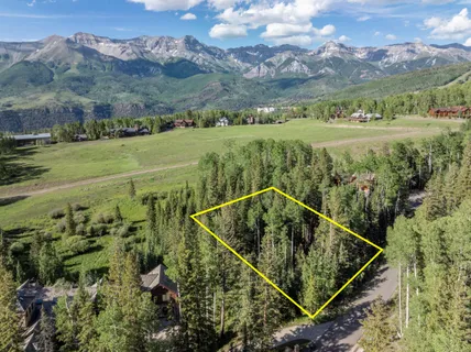 a view of a balcony with an outdoor space and seating