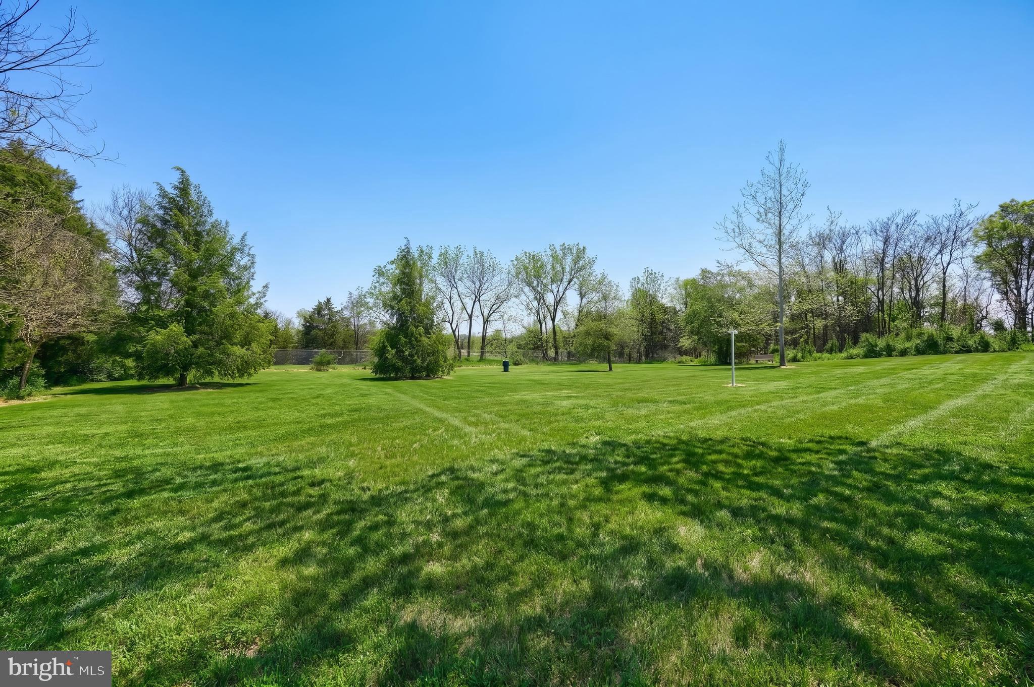 355 Sachs Road Gettysburg, PA 17325 - Photo 28 of 49 a view of a grassy field with trees in the background