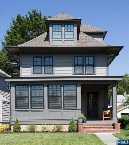 a house that has garden in front of it