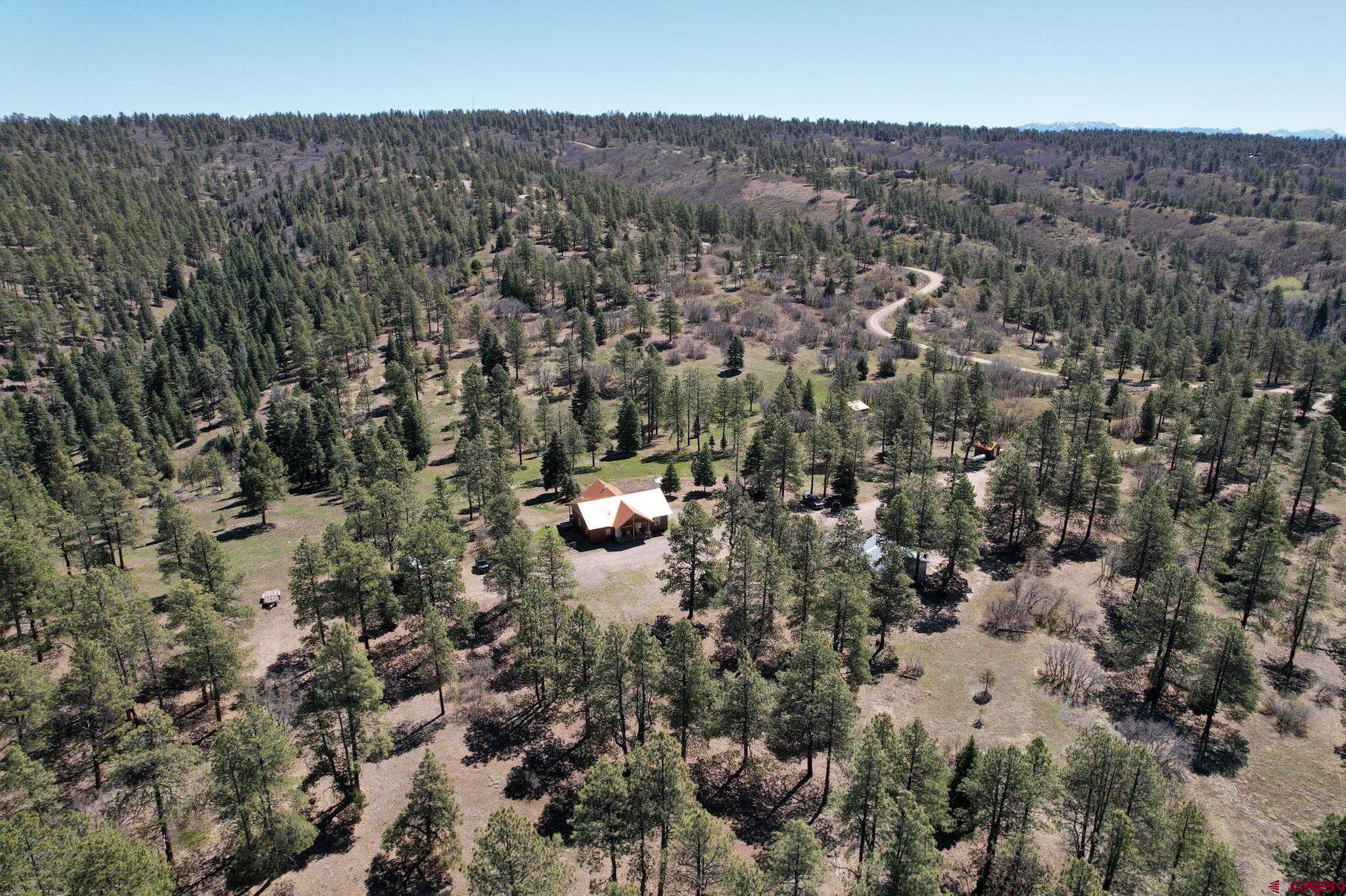 1798 Ranchland Drive Pagosa Springs, CO 81147 - Photo 41 of 45 an aerial view of a house with a yard