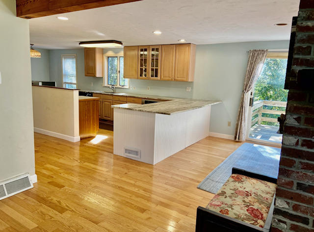 8 Sumner Lane Brewster, MA 02631 - Photo 20 of 43 a kitchen with stainless steel appliances granite countertop a sink and a stove