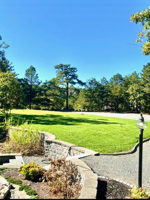 8 Sumner Lane Brewster, MA 02631 - Photo 2 of 43 a view of a golf course with a lake view