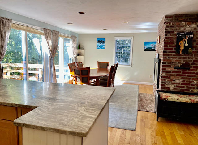 8 Sumner Lane Brewster, MA 02631 - Photo 22 of 43 a living room with furniture and wooden floor