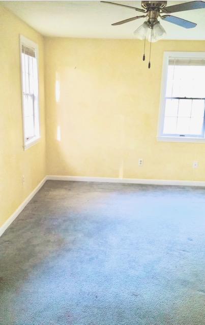 8 Sumner Lane Brewster, MA 02631 - Photo 23 of 43 an empty room with a window and a ceiling fan