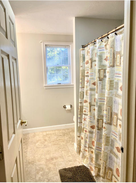 8 Sumner Lane Brewster, MA 02631 - Photo 24 of 43 a bathroom with a shower and a tub