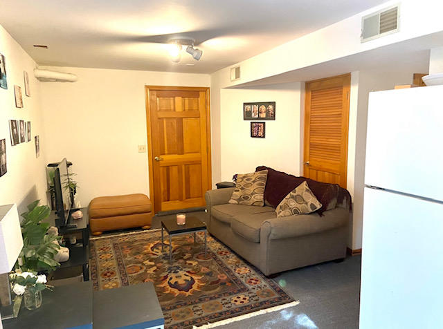 8 Sumner Lane Brewster, MA 02631 - Photo 36 of 43 a living room with furniture and a couch