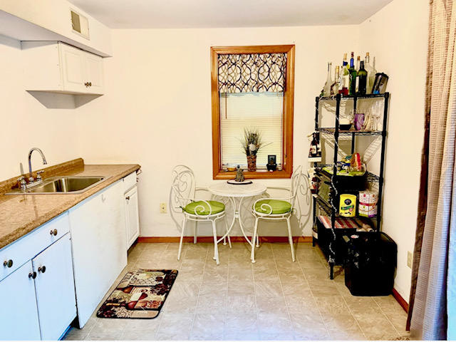 8 Sumner Lane Brewster, MA 02631 - Photo 37 of 43 a living room with furniture and natural light