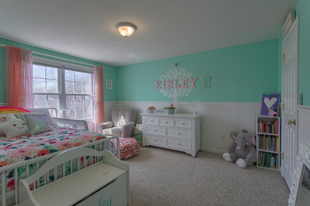 13 Golf Avenue, Unit 13 Methuen, MA 01844 - Photo 15 of 30 a bedroom with a bed and a window