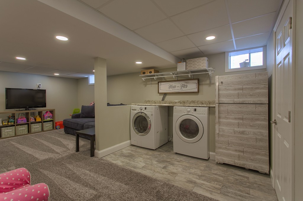 13 Golf Avenue, Unit 13 Methuen, MA 01844 - Photo 23 of 30 a view of a storage & utility room with washer and dryer