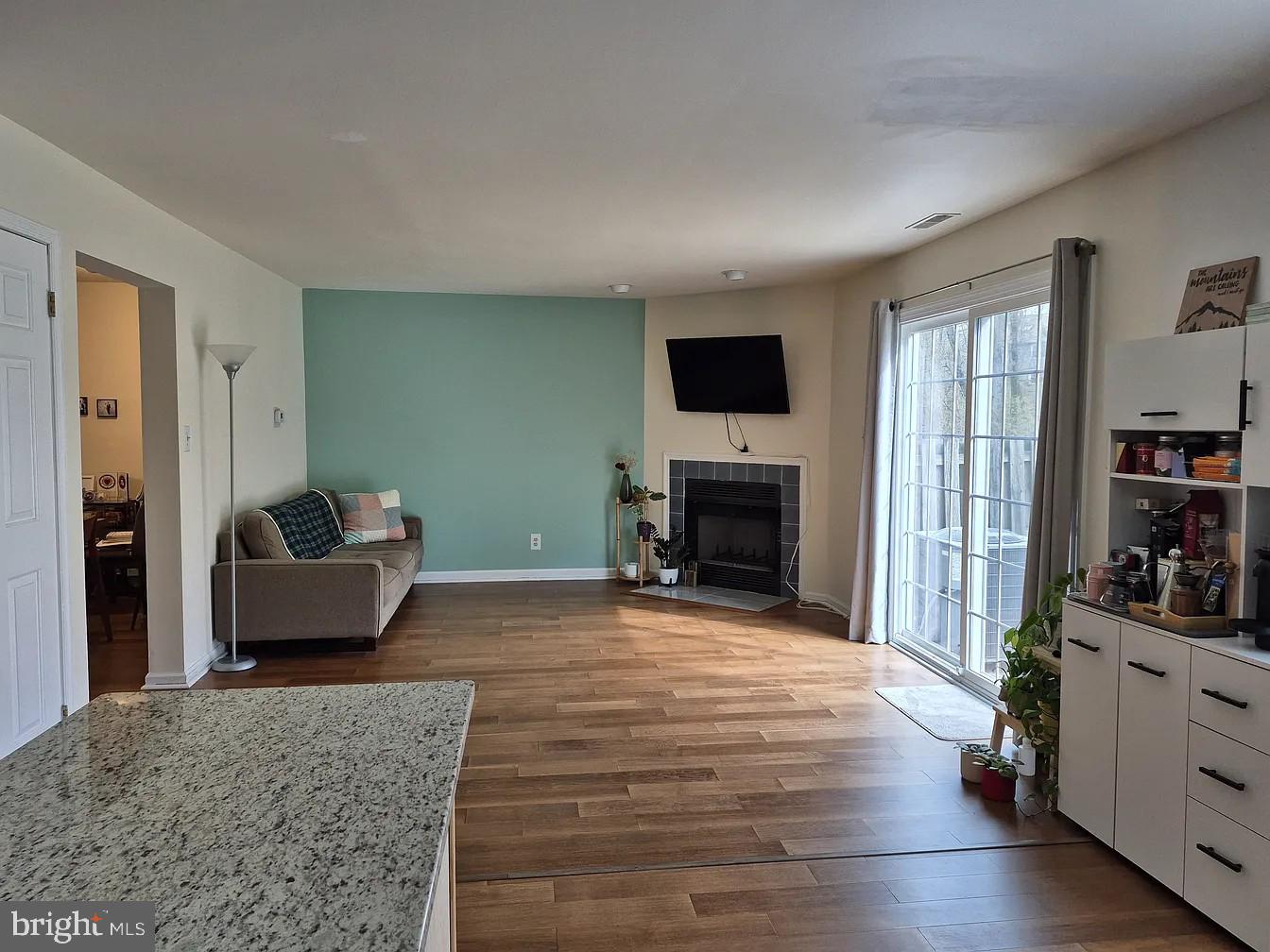 262 Tulip Tree Court Blue Bell, PA 19422 - Photo 14 of 32 a living room with furniture and a flat screen tv