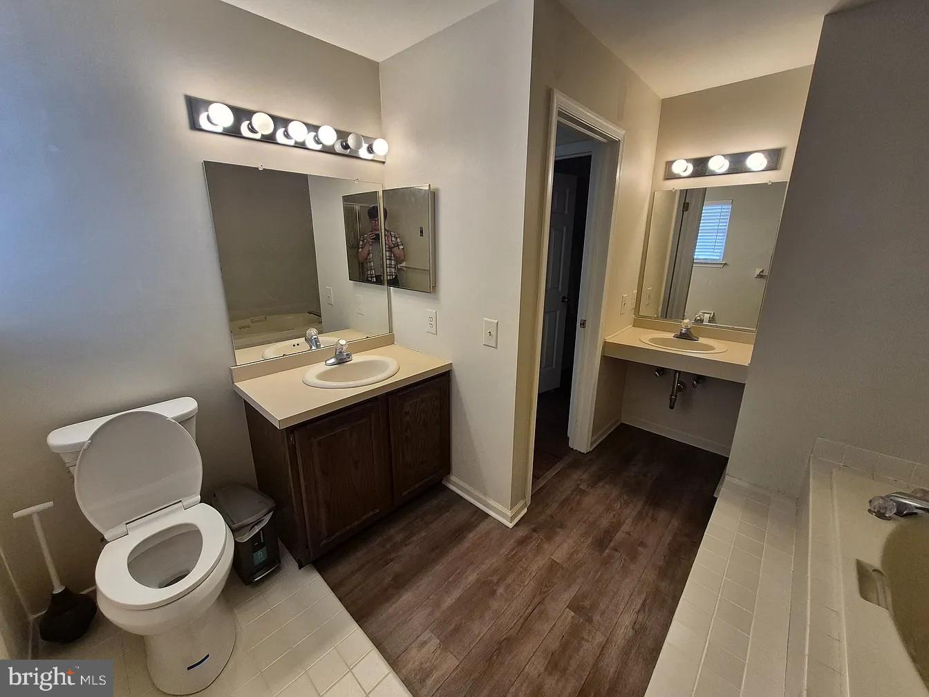262 Tulip Tree Court Blue Bell, PA 19422 - Photo 27 of 32 a bathroom with a sink and a mirror